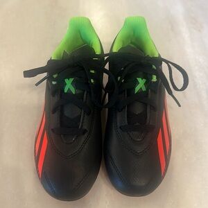 Brand new never worn kids soccer shoes